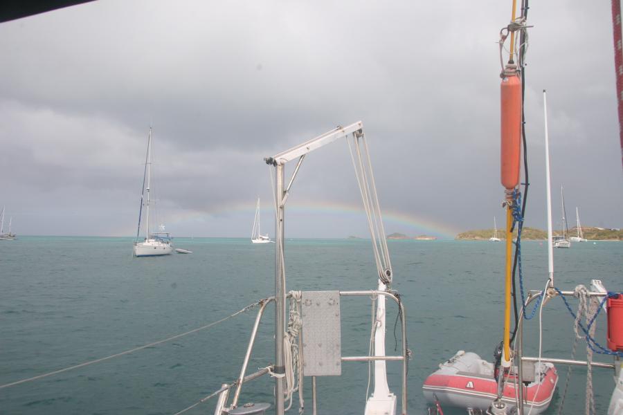 Rainbow over ocean from boat